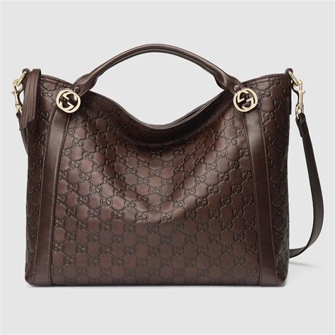 brown gucci background|Gucci brown leather bag vintage.